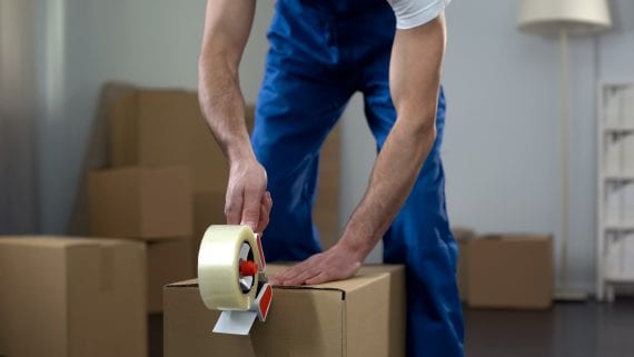 Moving,Company,Worker,Packing,Cardboard,Boxes,,Quality,Delivery,Services